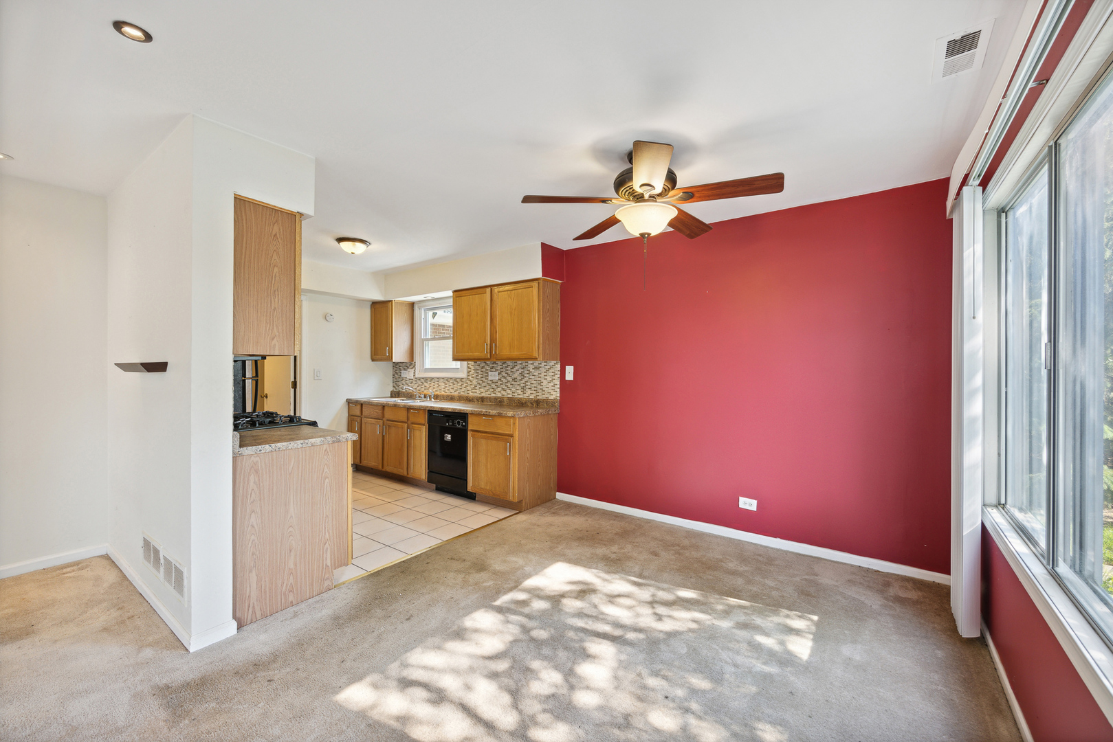 9 Red Barn Road Matteson, IL 60443 - Photo 7 of 18 a view of a kitchen with a sink and a refrigerator