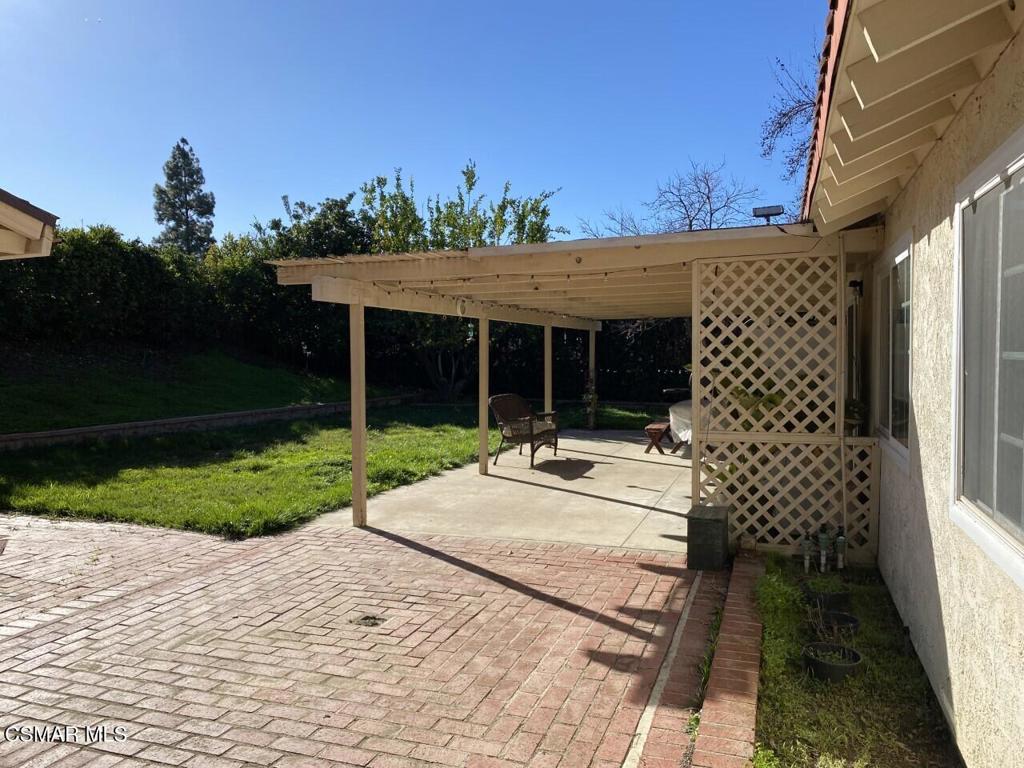 652 Harper Street Simi Valley, CA 93065 - Photo 15 of 27 a view of a house with a yard and pathway