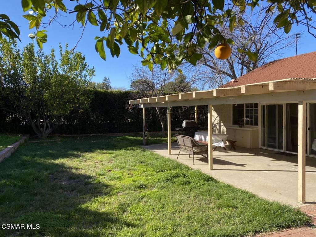 652 Harper Street Simi Valley, CA 93065 - Photo 2 of 27 a view of a chair and table in the garden