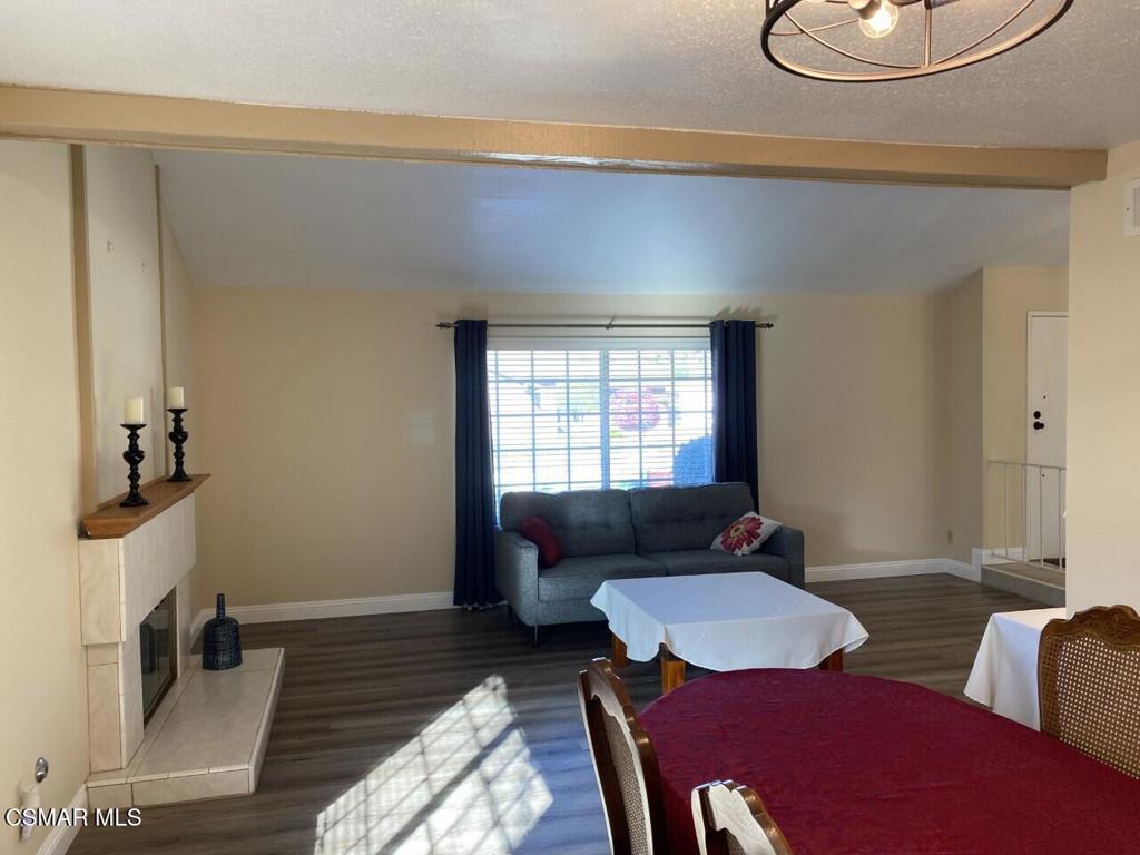 652 Harper Street Simi Valley, CA 93065 - Photo 9 of 27 a living room with furniture and a window