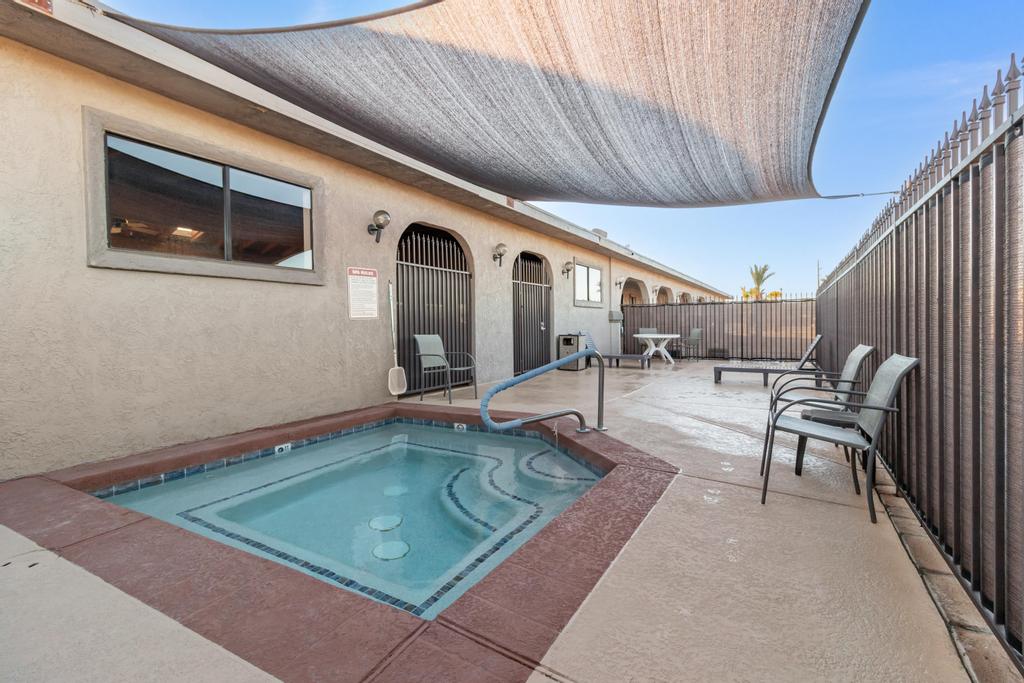 1545 East El Rodeo Road, Unit 42 Fort Mohave, AZ 86426 - Photo 38 of 45 a swimming pool with outdoor seating