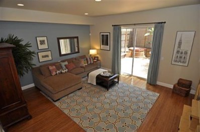 85 Rousseau Street San Francisco, CA 94112 - Photo 1 of 1 a bedroom with a bed window and couch