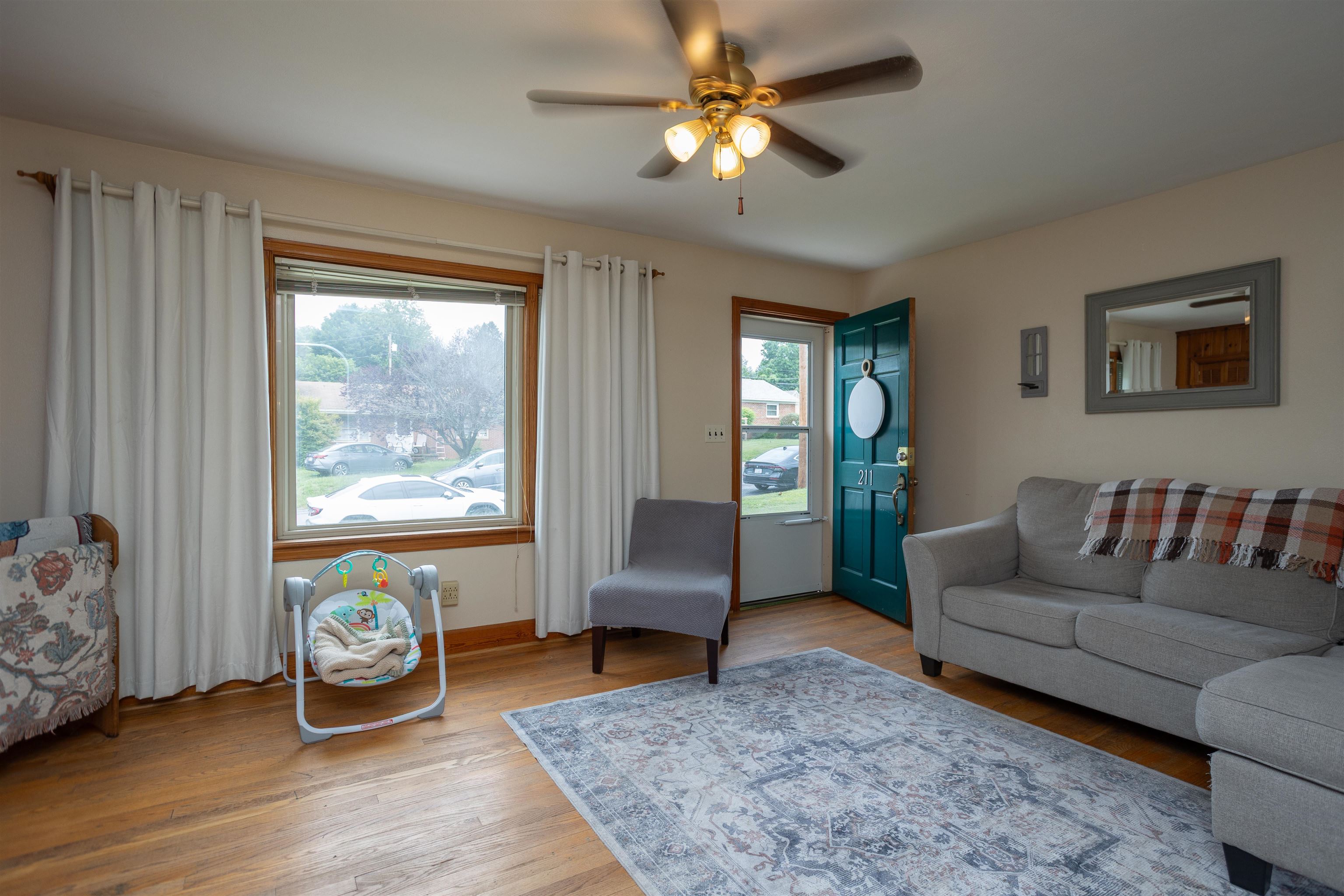 211 George Street Staunton, VA 24401 - Photo 6 of 37 a living room with furniture and a table