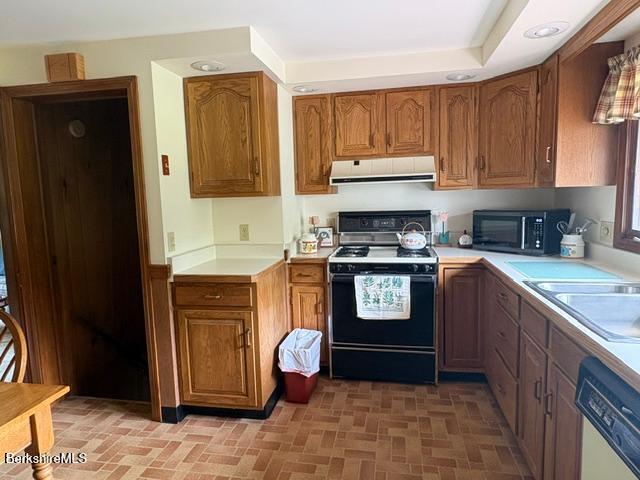 148 Friend Street Adams, MA 01220 - Photo 5 of 28 a kitchen with stainless steel appliances granite countertop a refrigerator a stove a sink and a microwave