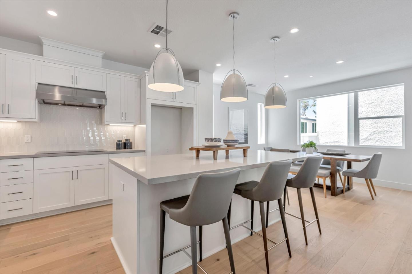 521 Lapis Court San Ramon, CA 94583 - Photo 7 of 20 a large kitchen with a table and chairs