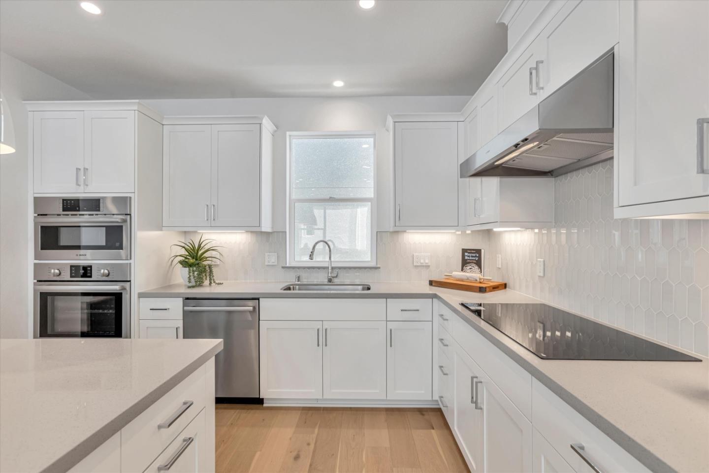 521 Lapis Court San Ramon, CA 94583 - Photo 8 of 20 a kitchen with stainless steel appliances granite countertop a sink stove and refrigerator