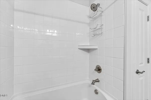 a bathroom with a sink toilet and tub