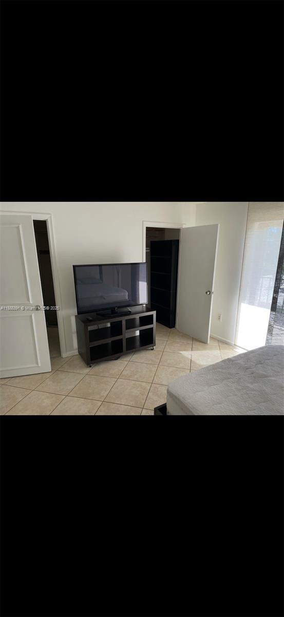 8255 Abbott Avenue, Unit 402 Miami Beach, FL 33141 - Photo 15 of 32 a view of kitchen with microwave