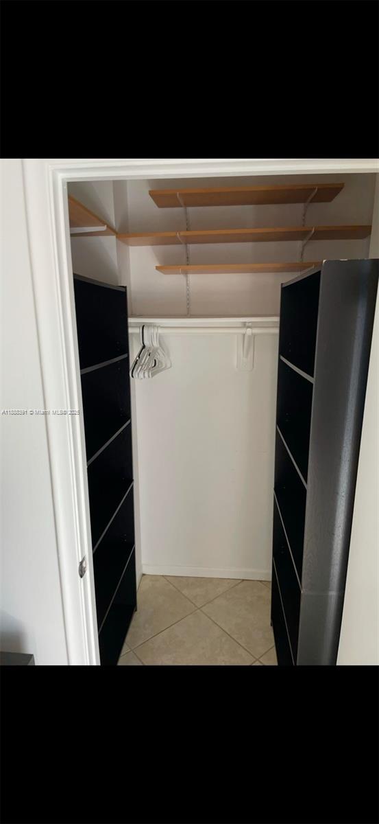 8255 Abbott Avenue, Unit 402 Miami Beach, FL 33141 - Photo 16 of 32 a view of closet