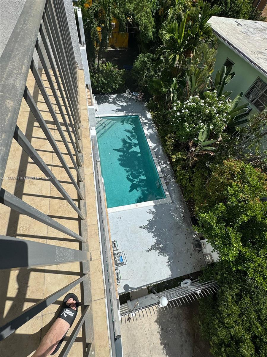 8255 Abbott Avenue, Unit 402 Miami Beach, FL 33141 - Photo 28 of 32 a view of a backyard