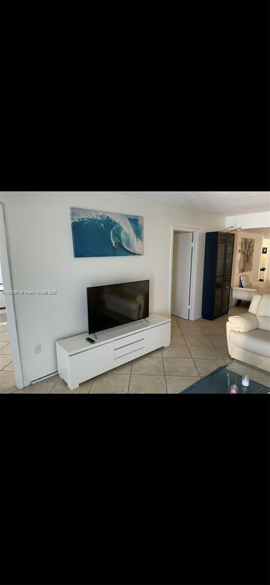 8255 Abbott Avenue, Unit 402 Miami Beach, FL 33141 - Photo 5 of 32 a view of a living room