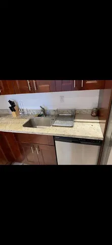 a view of a swimming pool with an outdoor seating