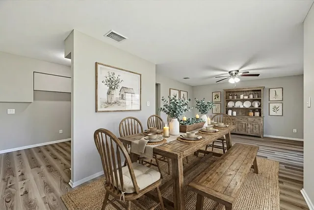 a view of a dining room with furniture