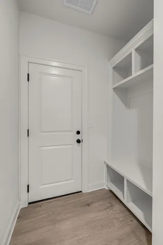 a bathroom with a double vanity sink mirror and double