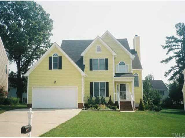 9204 Dawnshire Road Raleigh, NC 27615 - Photo 1 of 1 a front view of a house with a yard and trees