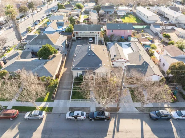 an aerial view of a house with a garden