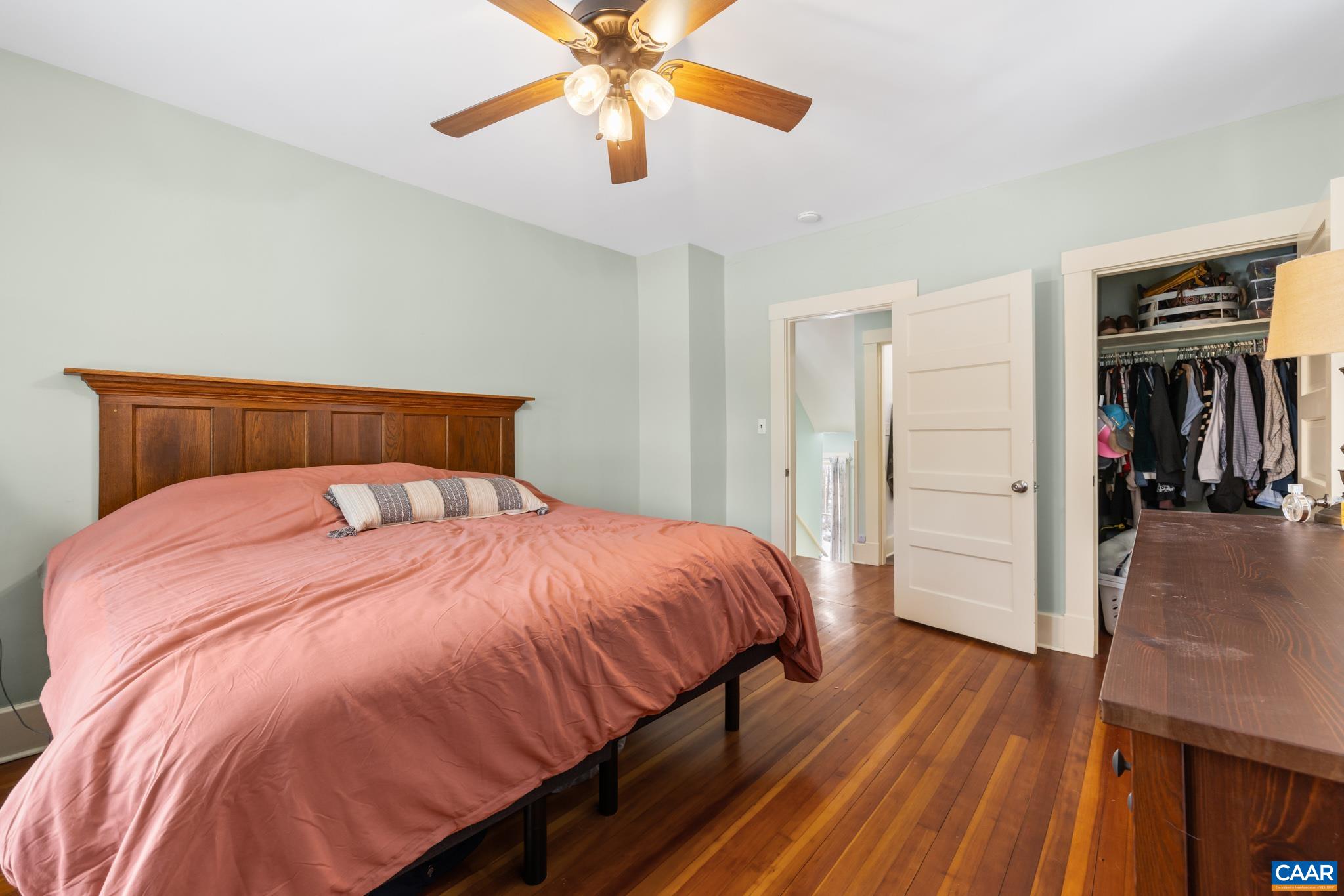 4615 Davis Highway Louisa, VA 23093 - Photo 18 of 29 a bedroom with a bed and a chandelier