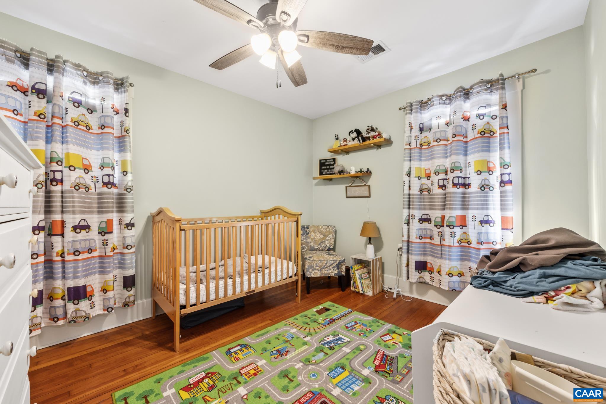 4615 Davis Highway Louisa, VA 23093 - Photo 21 of 29 a bedroom with furniture and a book shelf