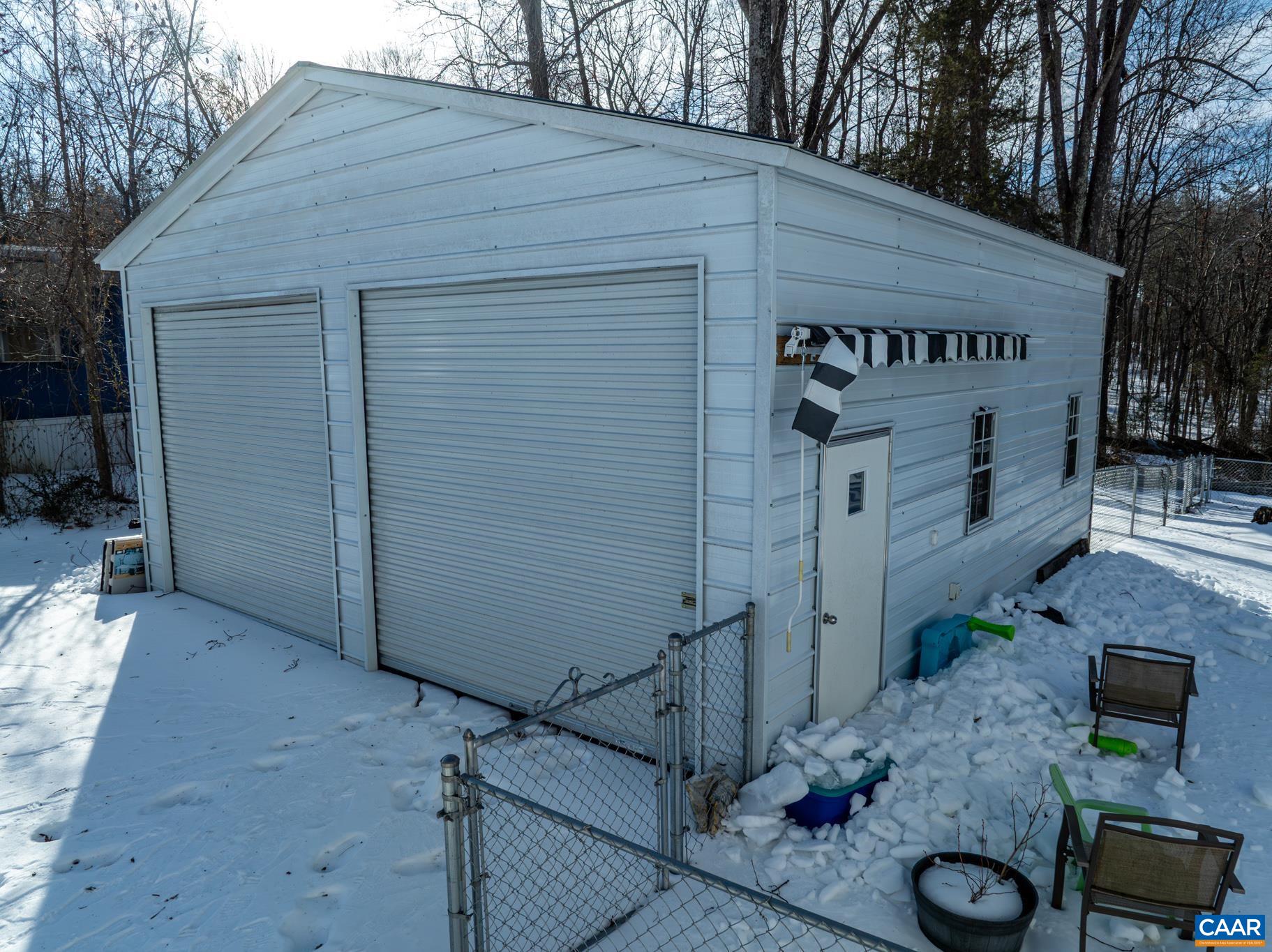 4615 Davis Highway Louisa, VA 23093 - Photo 28 of 29 a front view of a house with garage