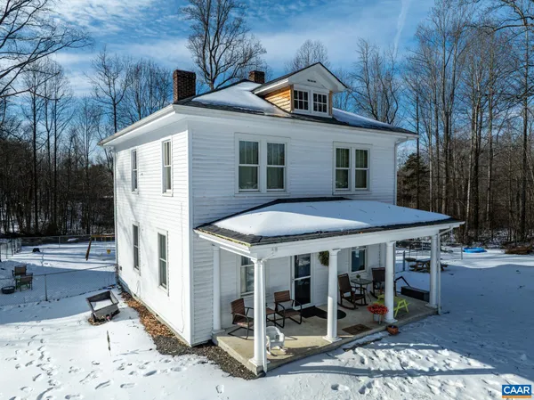 a front view of a house with glass doors