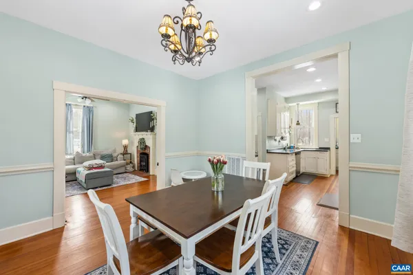a kitchen with stainless steel appliances a refrigerator and a stove