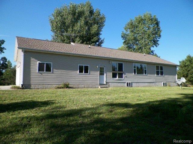 335 West Castle Road Fostoria, MI 48435 - Photo 24 of 28 262-132341 - Rear.JPG