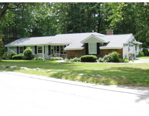 159 Turnpike Road Chelmsford, MA 01824 - Photo 1 of 1 a front view of a house with a yard