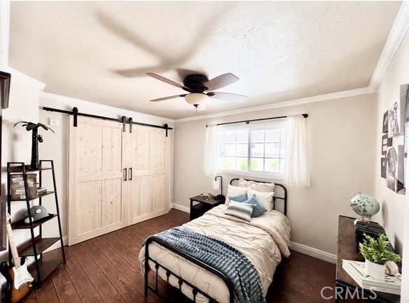 21104 Rosedell Drive Saugus, CA 91350 - Photo 23 of 33 Expanded bedroom with natural light, barn doors and versatile living space