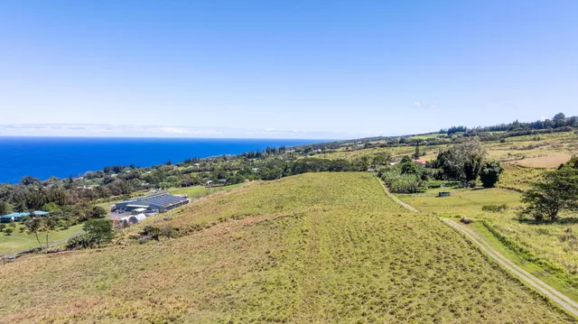 a bathroom with a sink mirror and vanity