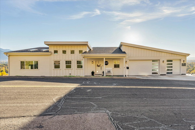 1800 Spring Oaks Drive Springville, UT 84663 - Photo 10 of 68 View of property with a garage and driveway
