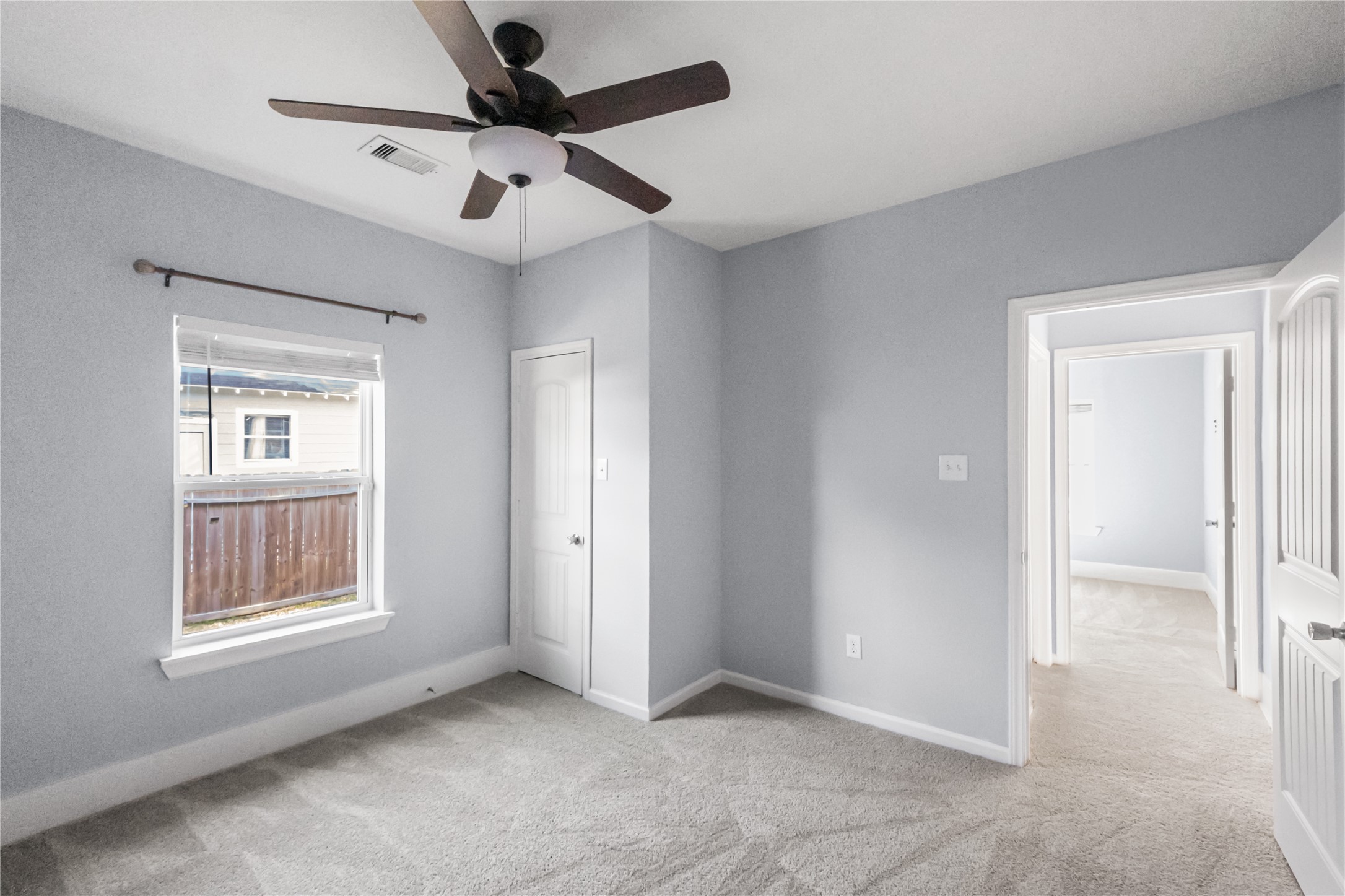 3108 Indiana Street Baytown, TX 77520 - Photo 14 of 20 a view of an empty room with a window