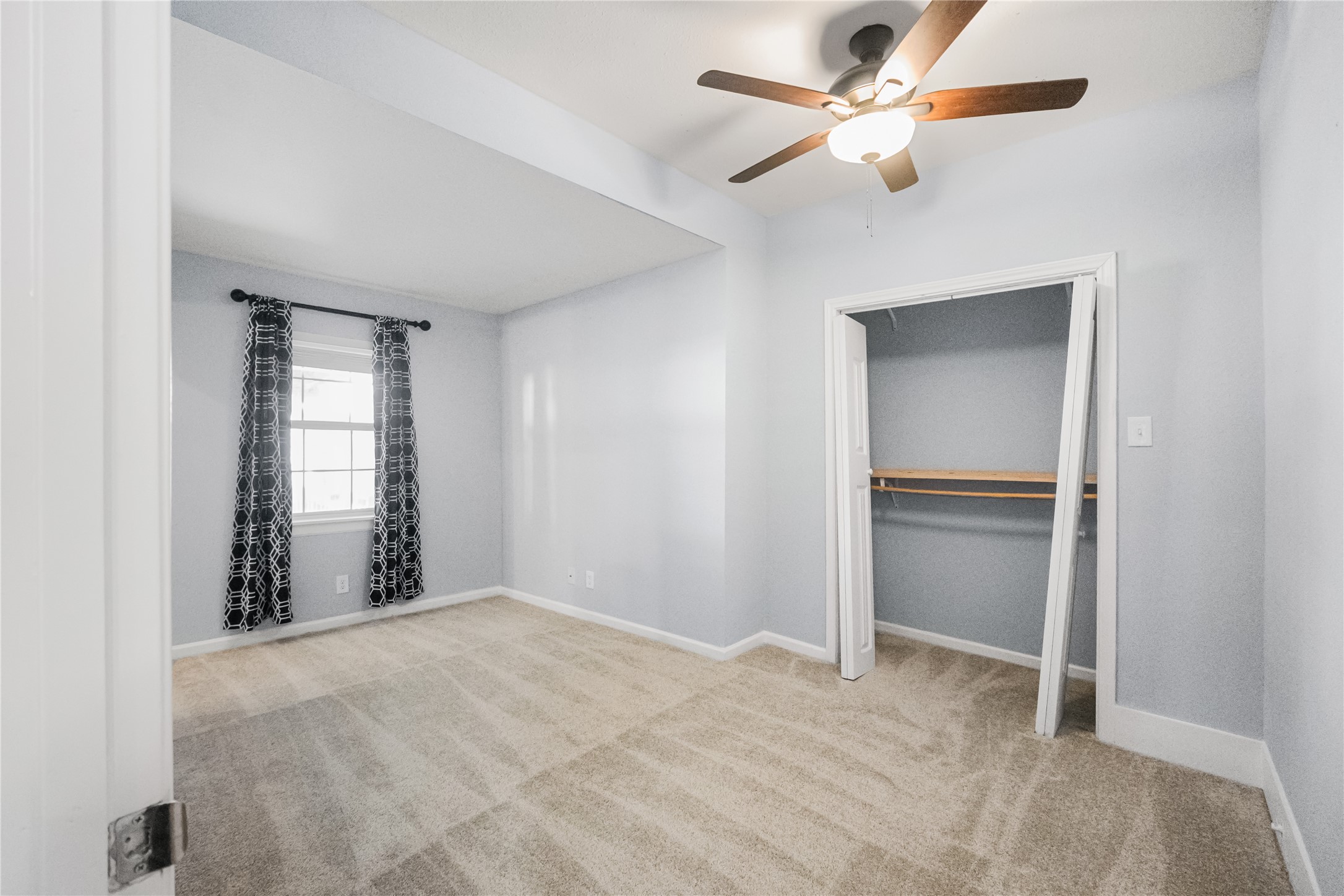 3108 Indiana Street Baytown, TX 77520 - Photo 9 of 20 a view of an empty room with a window