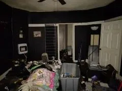 a kitchen with a stove and a refrigerator