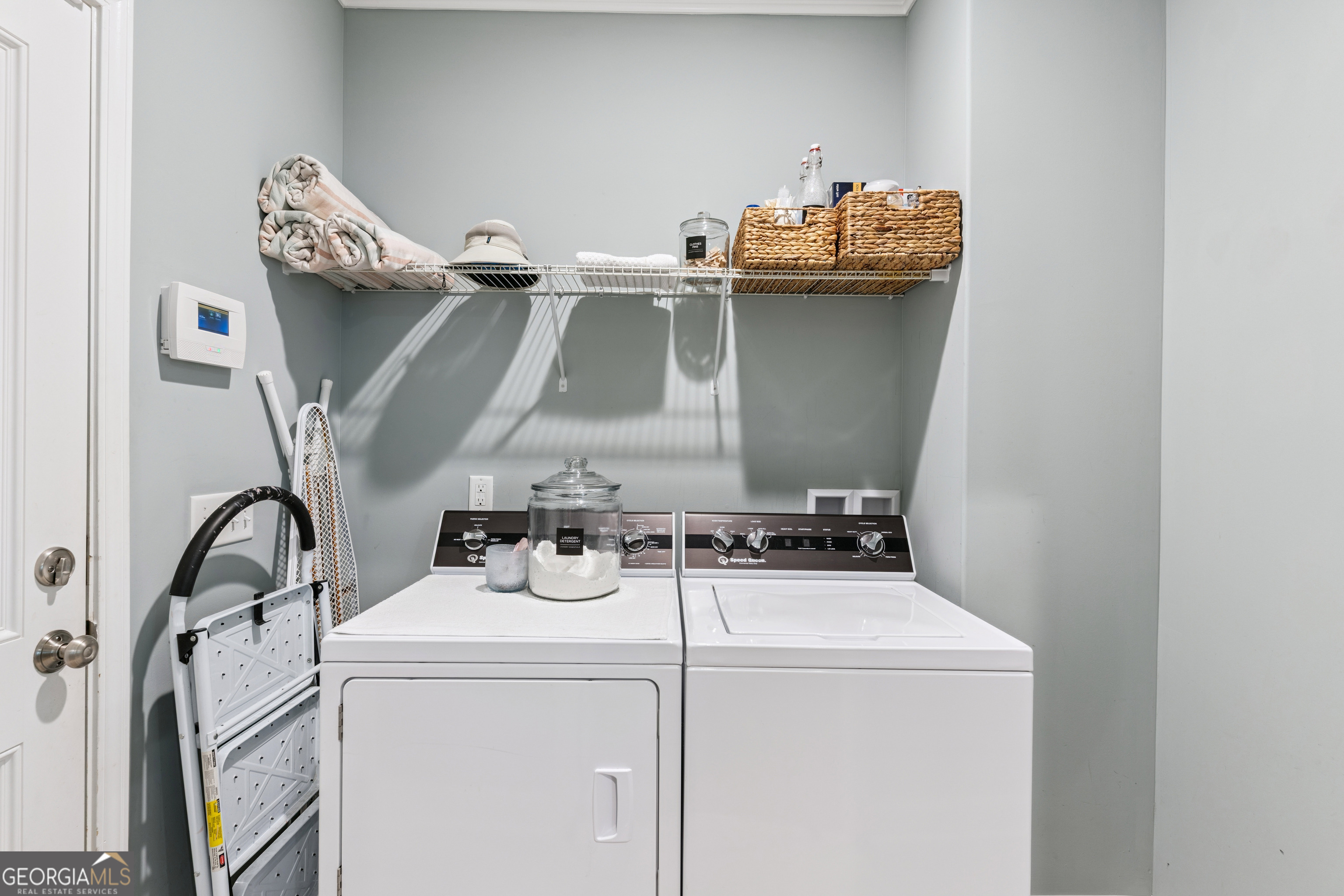 41 Simonton Lane St. Simons Island, GA 31522 - Photo 14 of 28 a utility room with dryer and washer