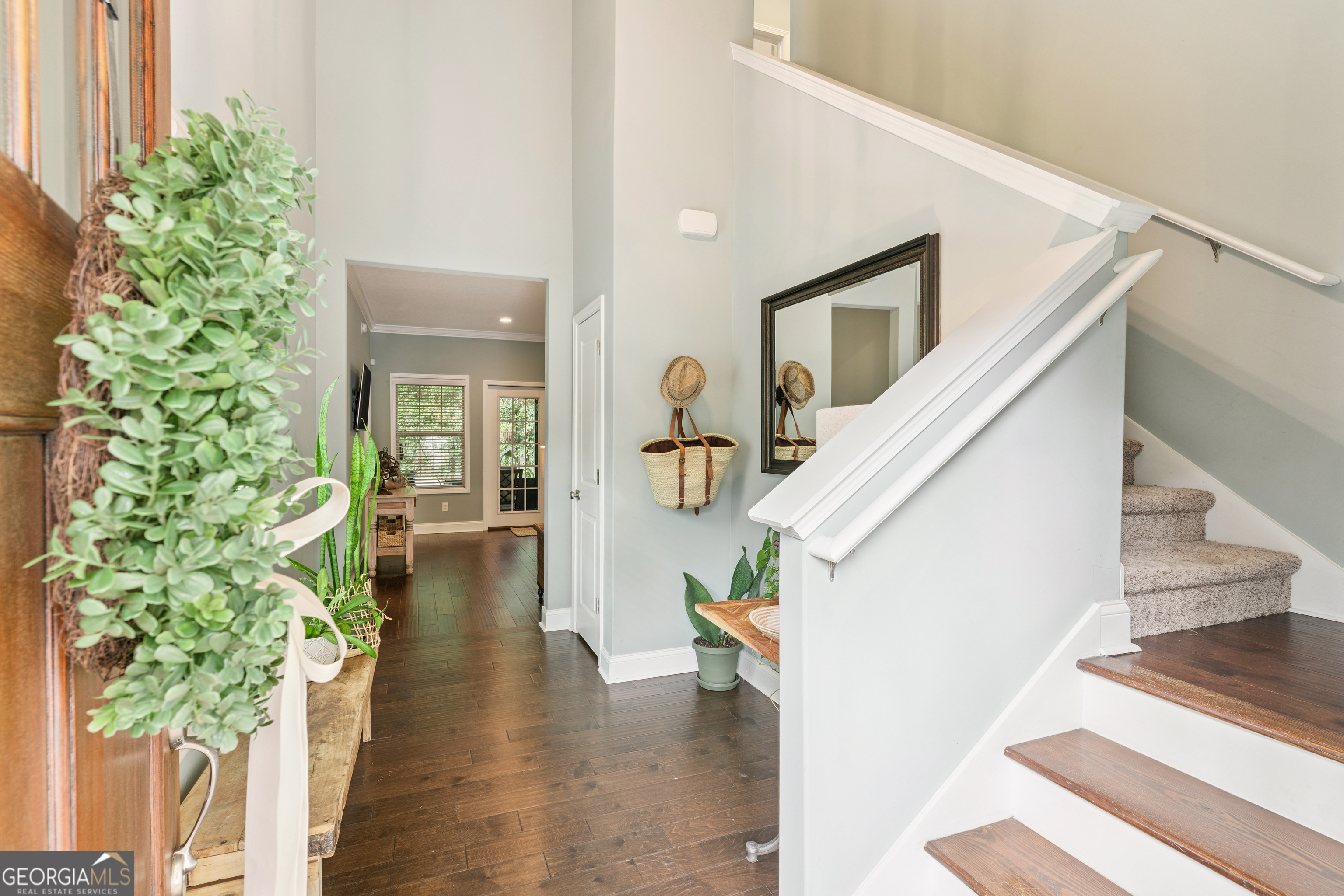 41 Simonton Lane St. Simons Island, GA 31522 - Photo 3 of 28 a view of entryway and hall with wooden floor