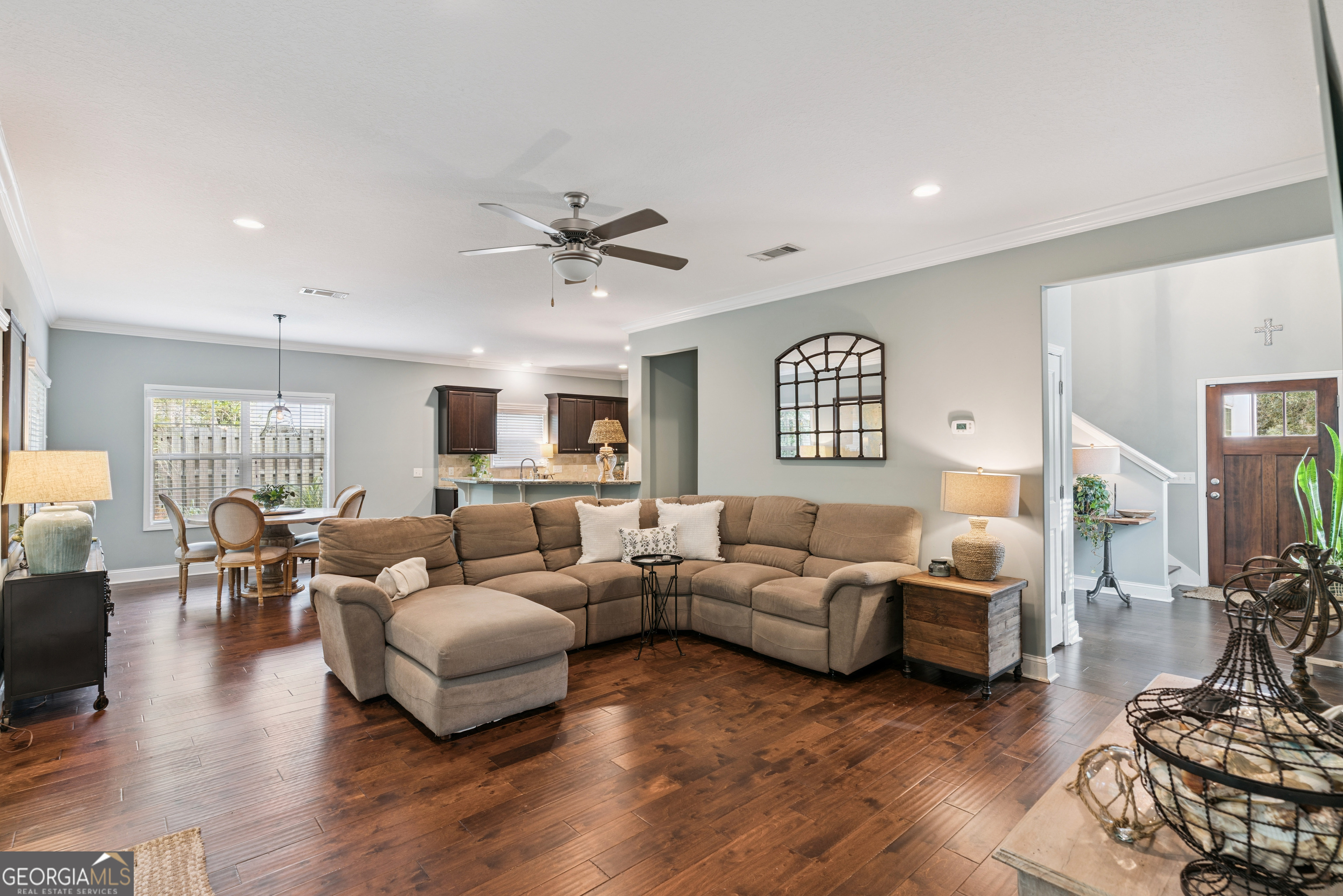 41 Simonton Lane St. Simons Island, GA 31522 - Photo 4 of 28 a living room with furniture and wooden floor
