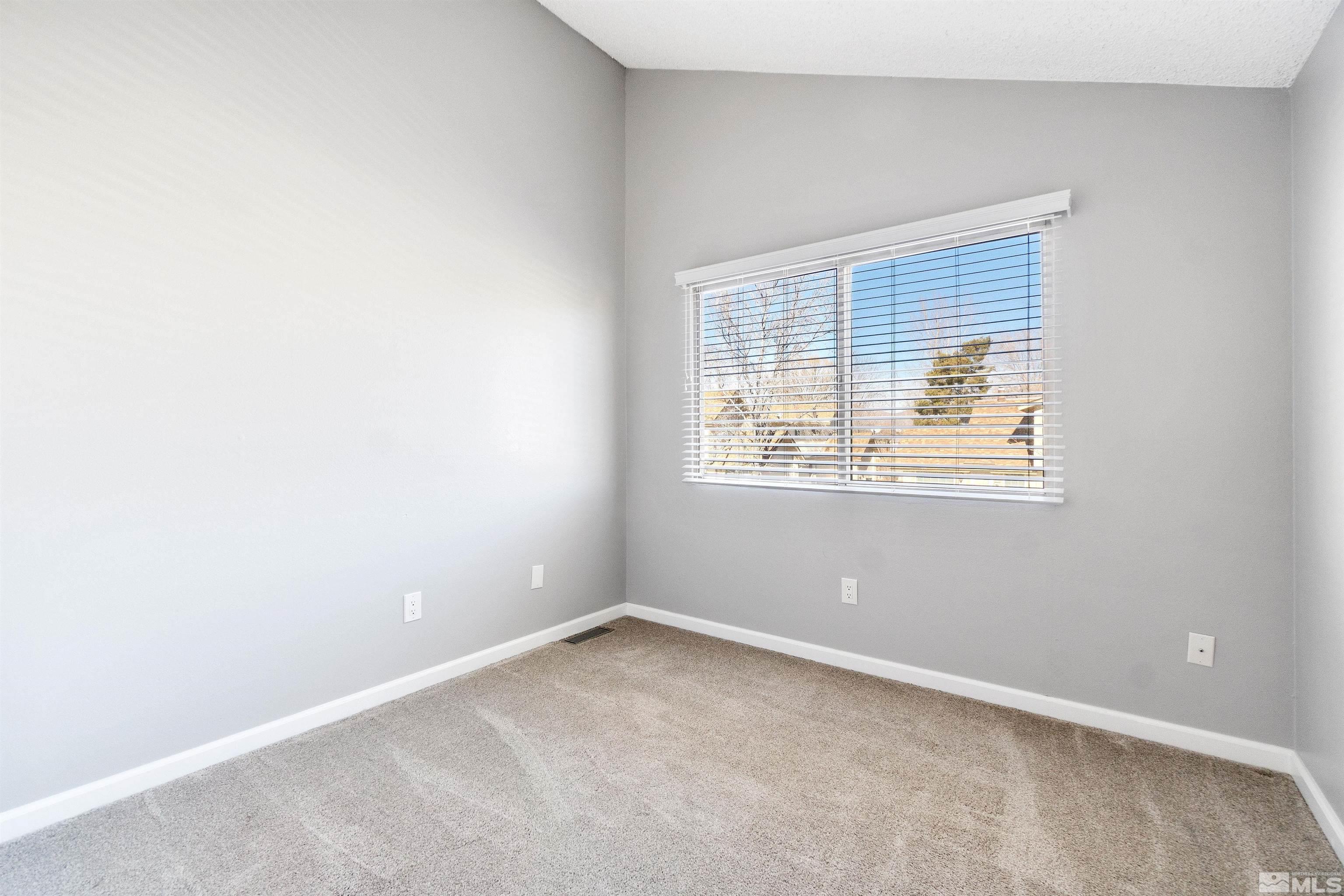29 Condor Circle Carson City, NV 89701 - Photo 20 of 28 an empty room with a window