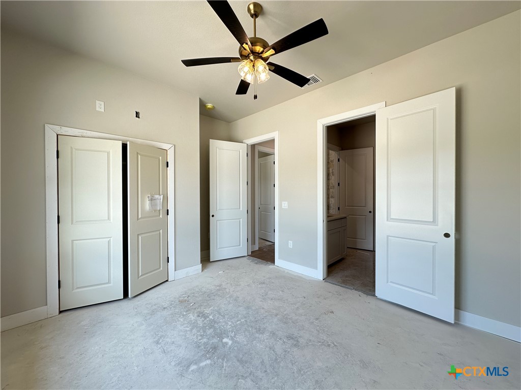 418 Dos Rios Drive Belton, TX 76513 - Photo 14 of 41 an empty room with closet and a ceiling fan