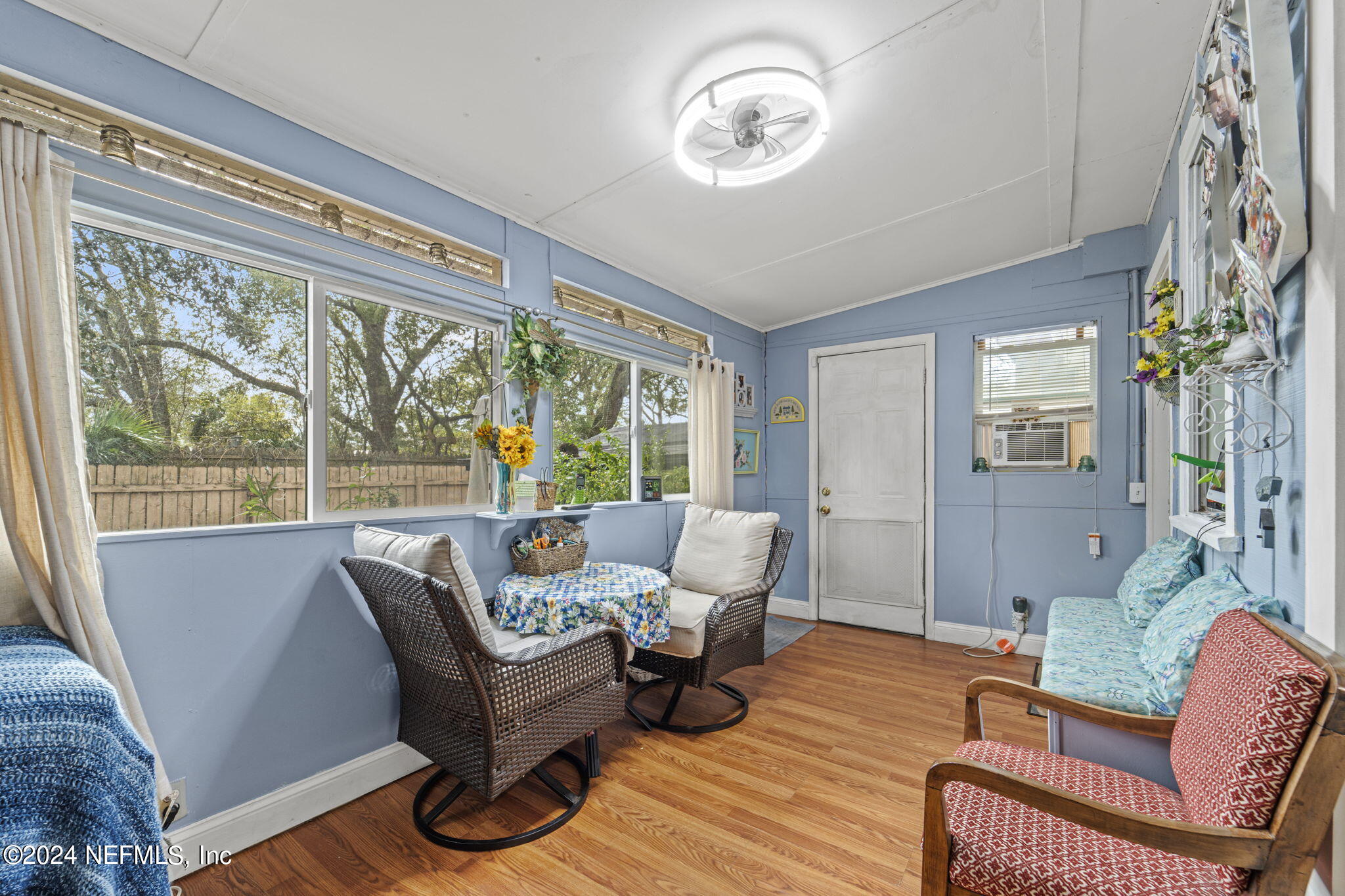 2038 Reed Avenue Jacksonville, FL 32207 - Photo 20 of 43 a living room with furniture and a large window