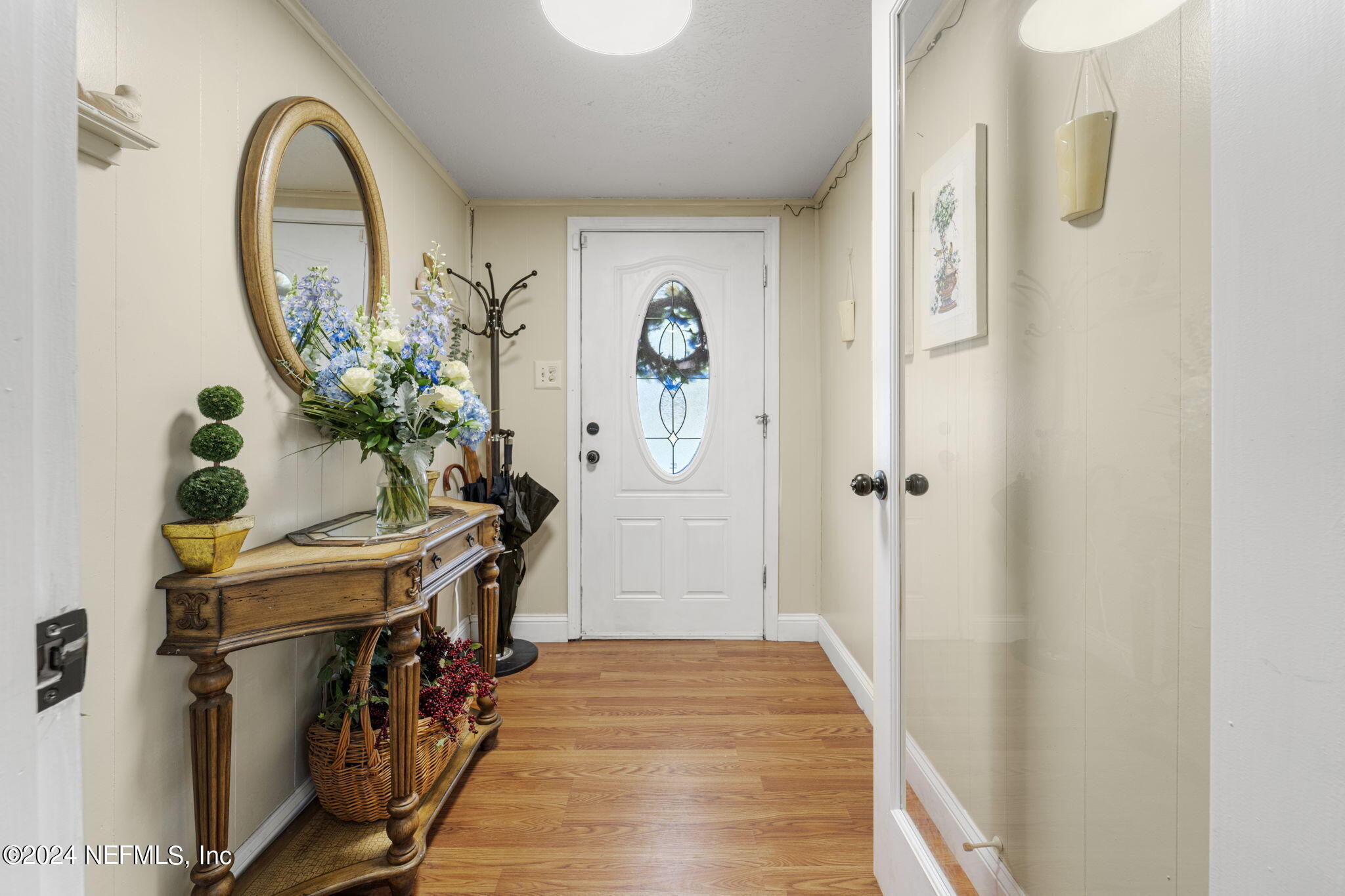 2038 Reed Avenue Jacksonville, FL 32207 - Photo 3 of 43 a view of an entryway with wooden floor