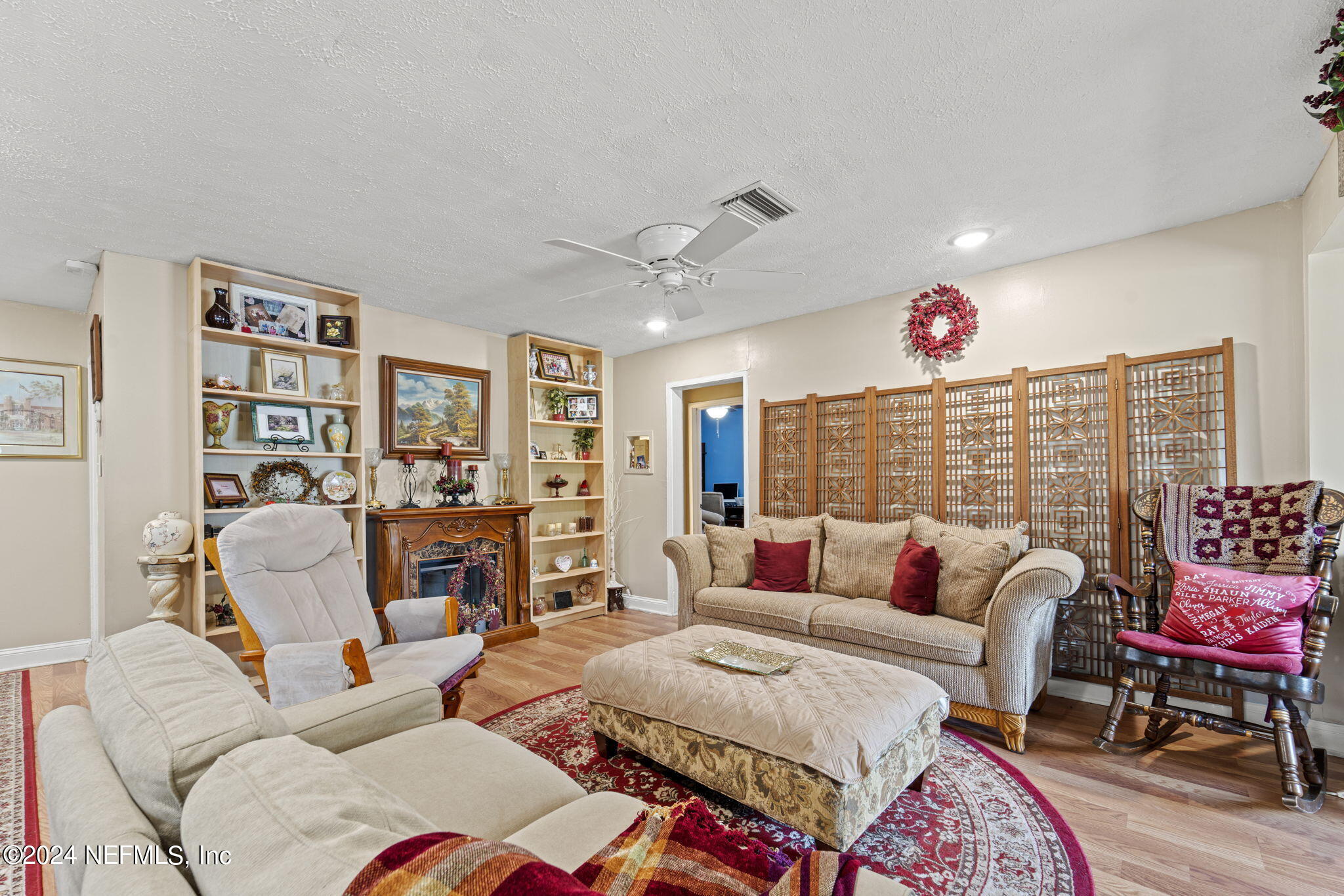 2038 Reed Avenue Jacksonville, FL 32207 - Photo 5 of 43 a living room with furniture and a flat screen tv