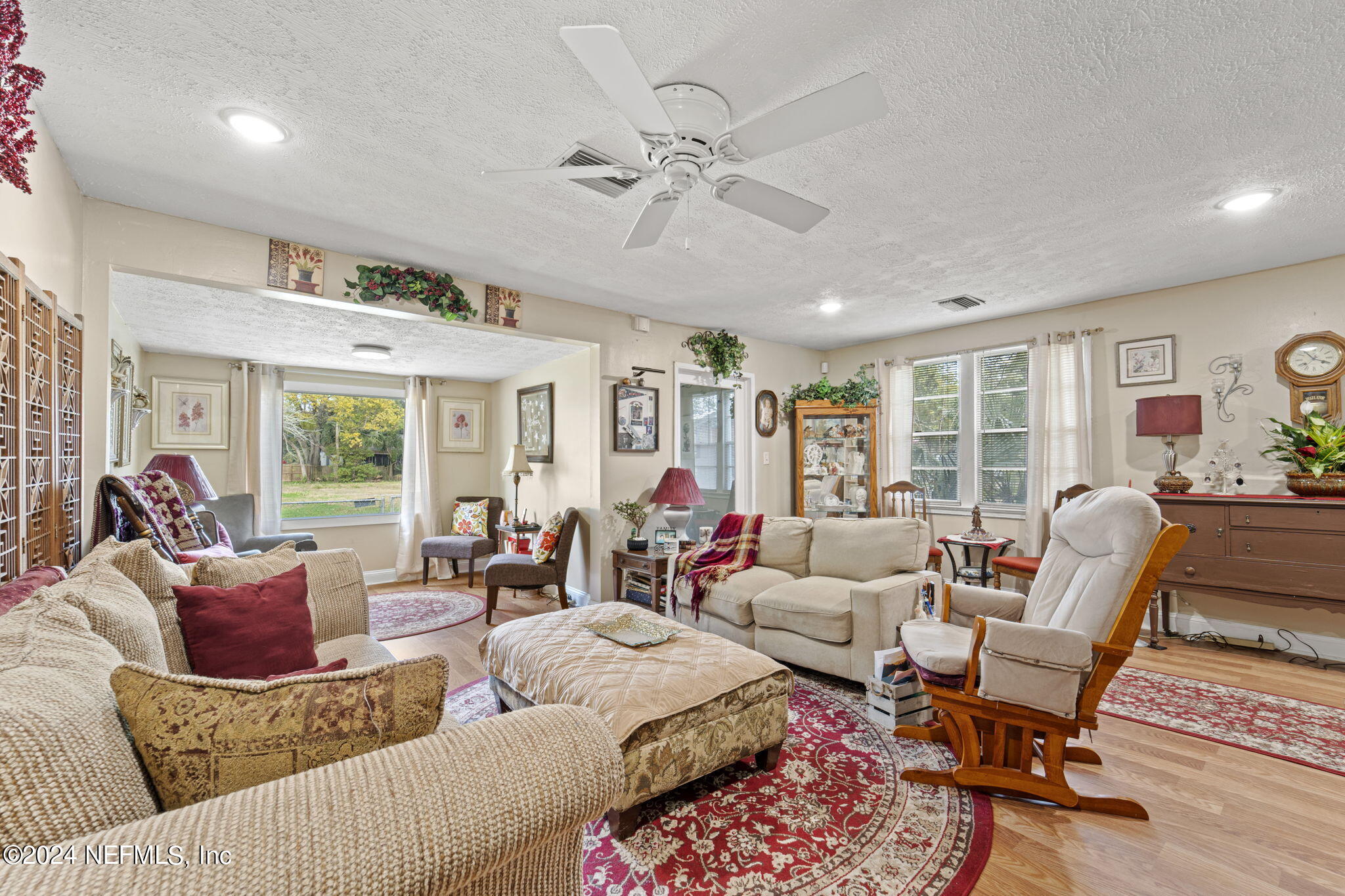 2038 Reed Avenue Jacksonville, FL 32207 - Photo 6 of 43 a living room with furniture and a large window