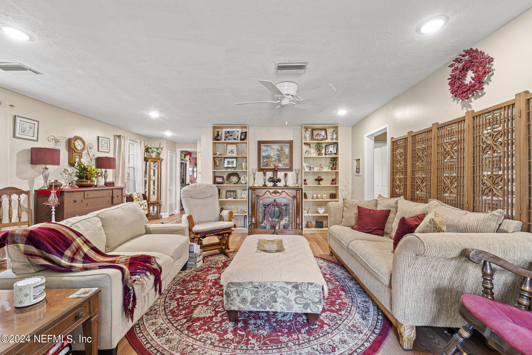 2038 Reed Avenue Jacksonville, FL 32207 - Photo 7 of 43 a living room with furniture and a rug