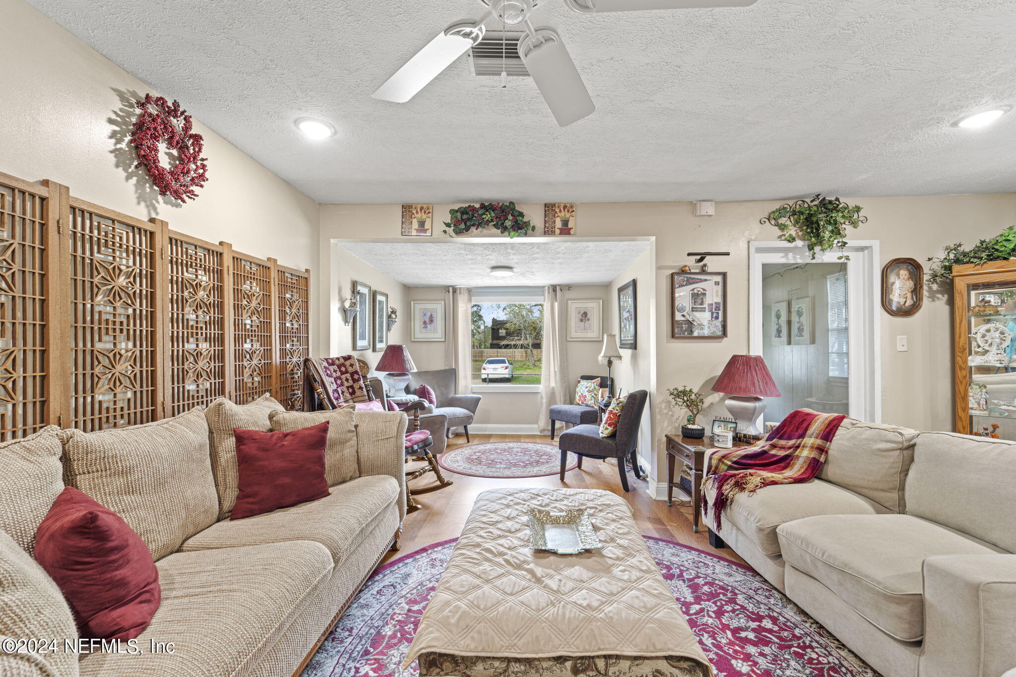 2038 Reed Avenue Jacksonville, FL 32207 - Photo 8 of 43 a living room with furniture and a large window