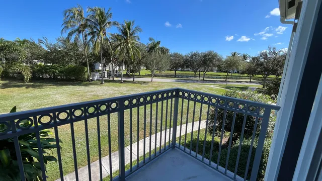 a view of swimming pool having outdoor seating