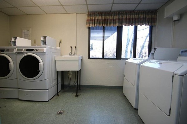 9 Broadway, Unit 217 Saugus, MA 01906 - Photo 16 of 18 a utility room with dryer and washer