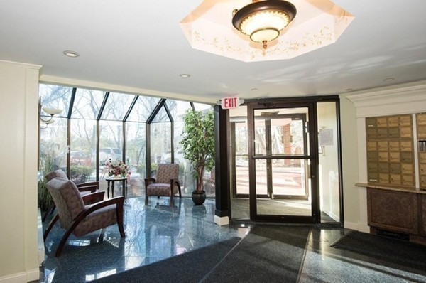9 Broadway, Unit 217 Saugus, MA 01906 - Photo 5 of 18 a view of a livingroom with furniture