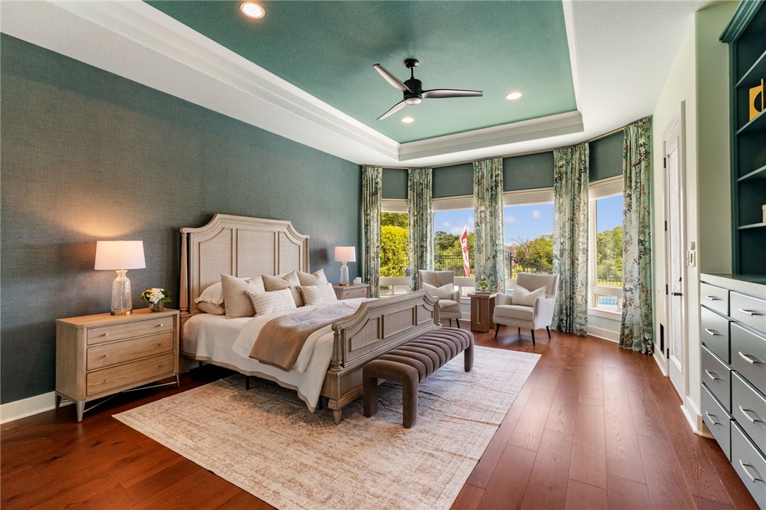2833 Persimmon Ridge Court Bryan, TX 77807 - Photo 3 of 50 a bedroom with a large bed and a large window