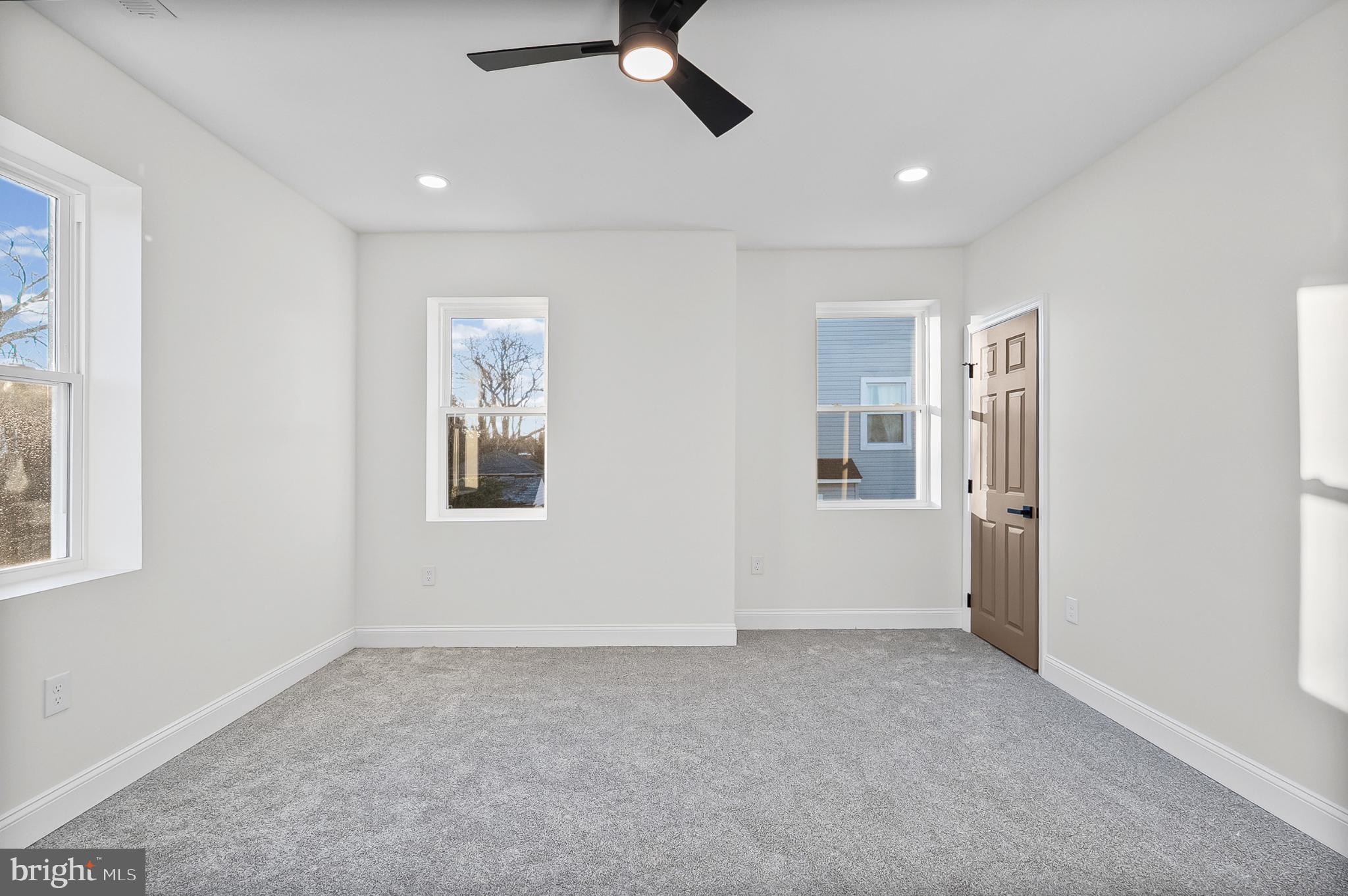 3703 Egerton Road Baltimore, MD 21215 - Photo 18 of 32 a view of an empty room with a window