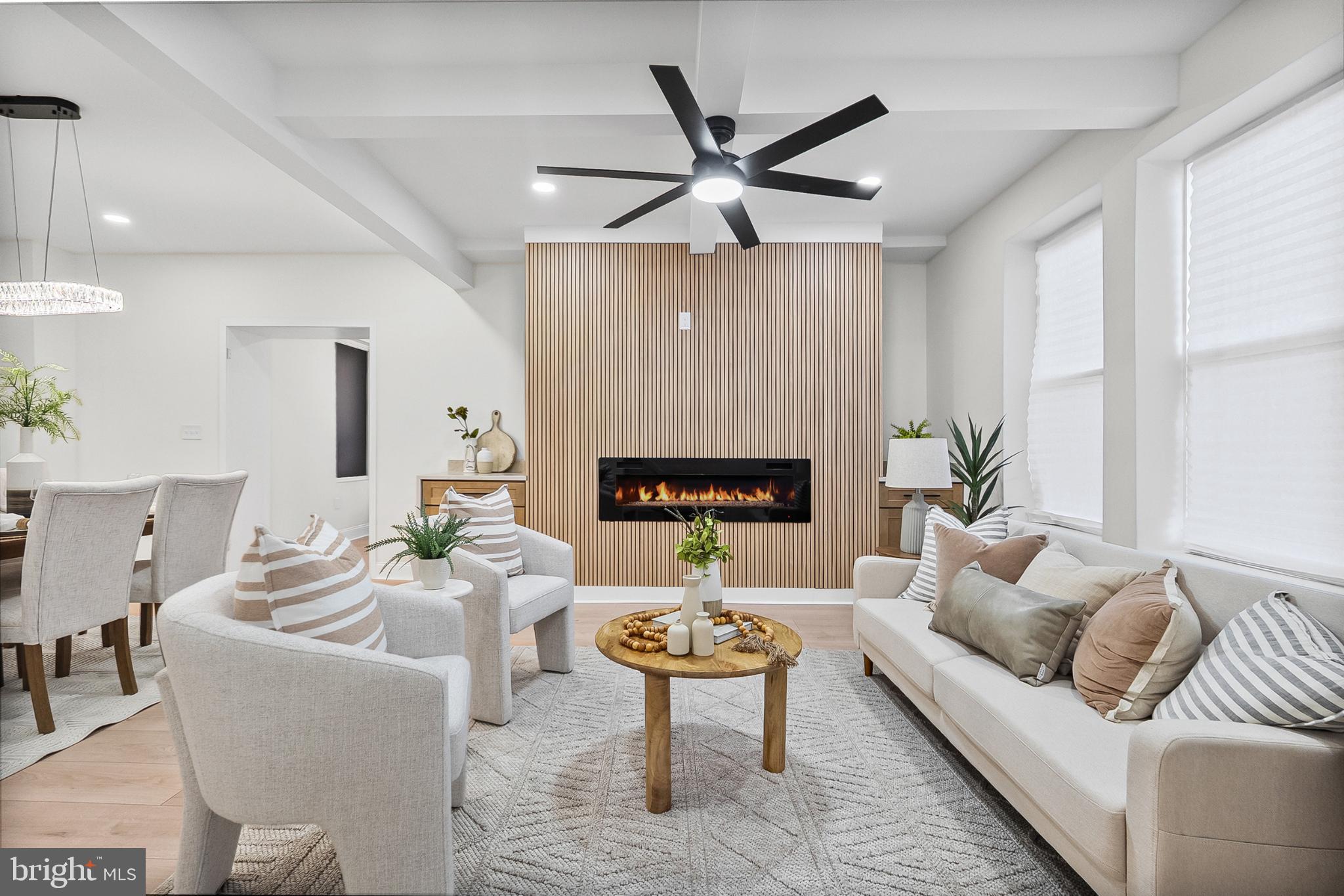 3703 Egerton Road Baltimore, MD 21215 - Photo 3 of 32 a living room with furniture and a large window